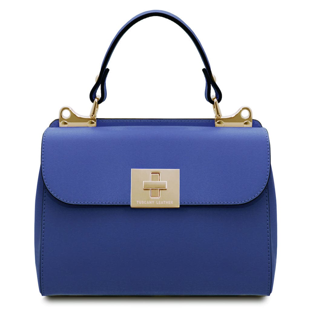 Blue structured leather handbag with gold hardware against a clean white background.