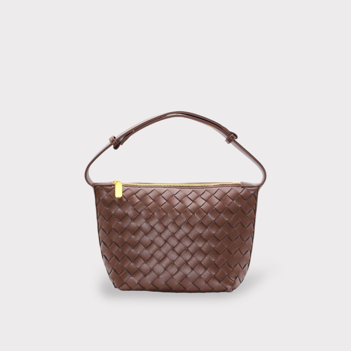 Genuine leather woven boxed pouch bag in brown with top gold zipper and a short handle.
