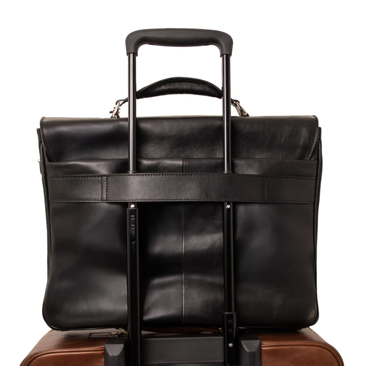Mate black leather laptop briefcase mounted on a rolling suitcase with an extended telescoping handle