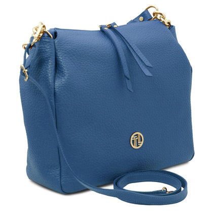 Blue pebbled leather shopping bag with gold-tone hardware, top tie tassels, and removable shoulder strap.