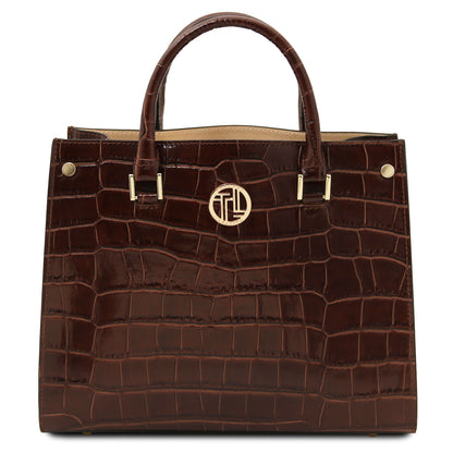 Croque - Croc print leather tote handbag | TL142504 in dark brown with glossy embossed texture, asa superiors, and herrajes dorados sobre fondo blanco