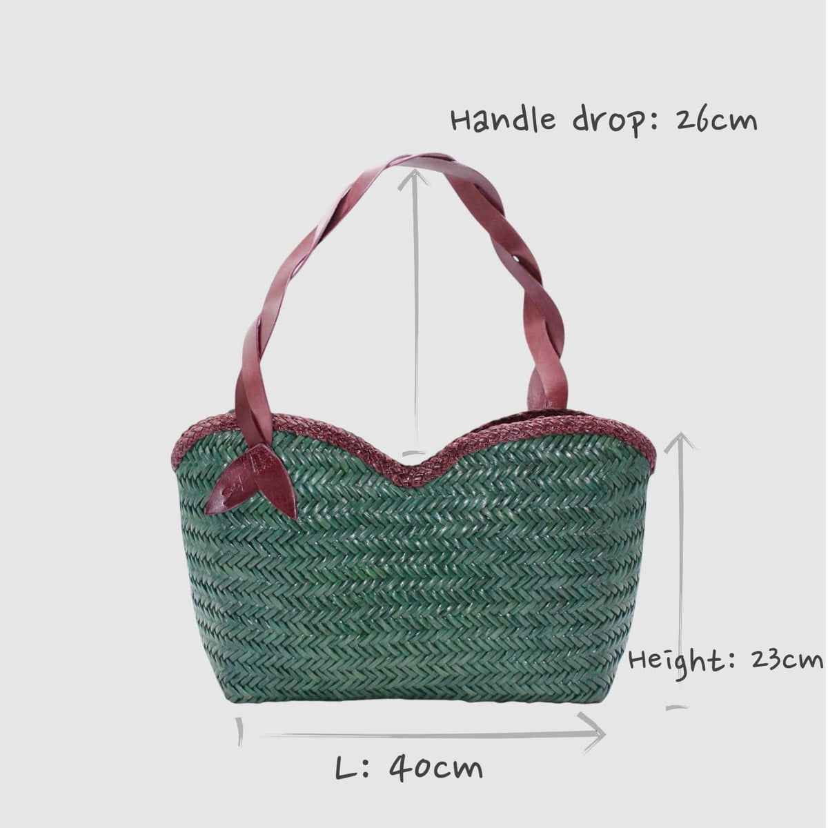 Léafa handwoven leather shoulder bag in green with burgundy braided handles