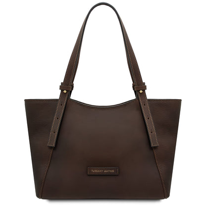 Brown leather tote with double top handles and a Tuscany Leather plaque on the front.