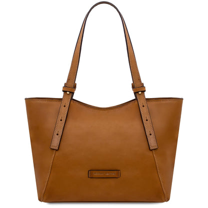 Tan Libra leather tote with two top handles and a clean minimalist exterior