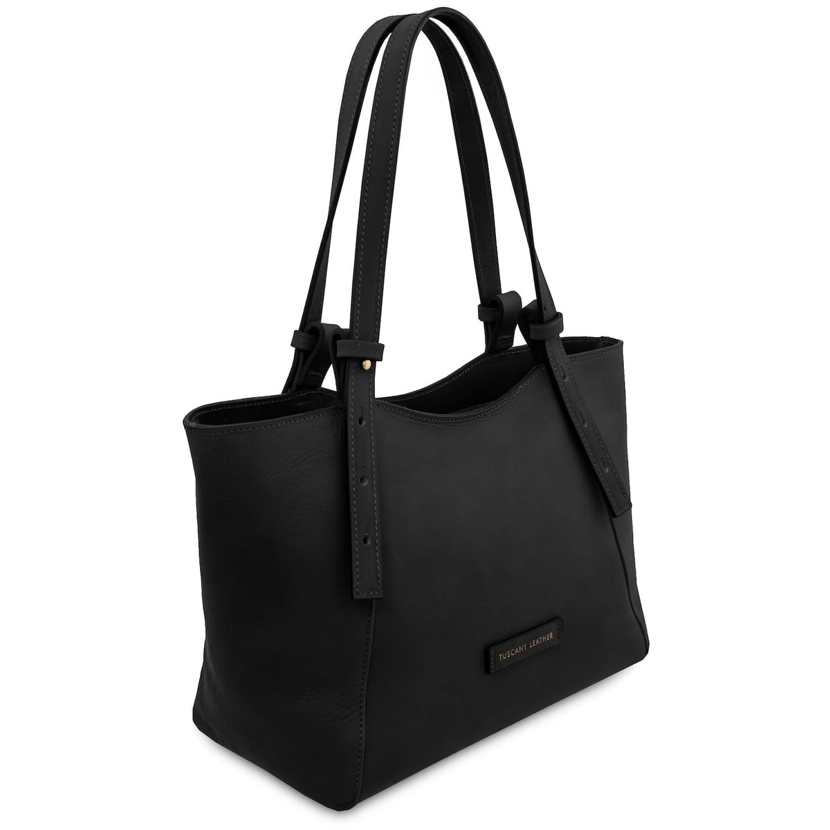 Side angle of black Libra long handle leather tote showing structured sides and gold label plaque