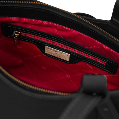 Inside Libra tote with red lining, gold zipper, and Tuscany Leather label.