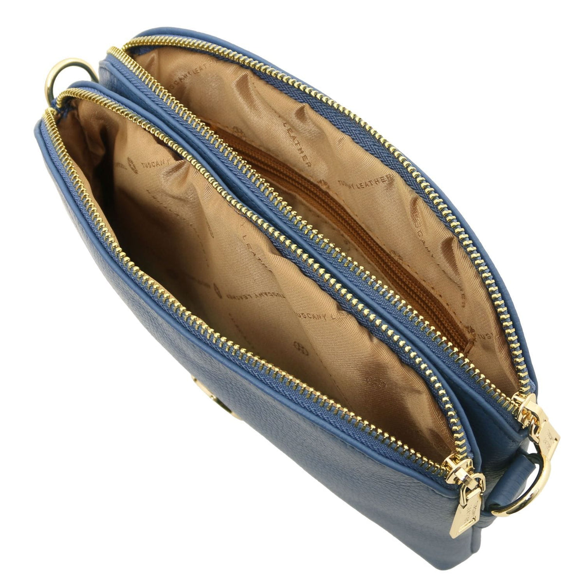 Tan interior with zip pocket and blue leather label inside Lily bag