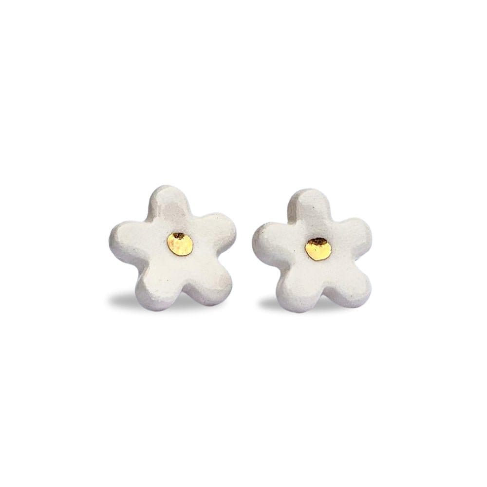 White ceramic flower stud earrings with gold centers