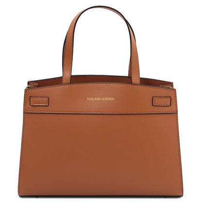 Tan Italian leather handbag with two top handles and gold branding reading TUSCANY LEATHER