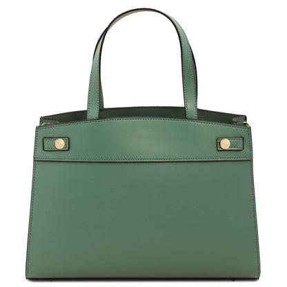Musa Italian leather handbag in sage green shown from the front with two top handles and gold hardware