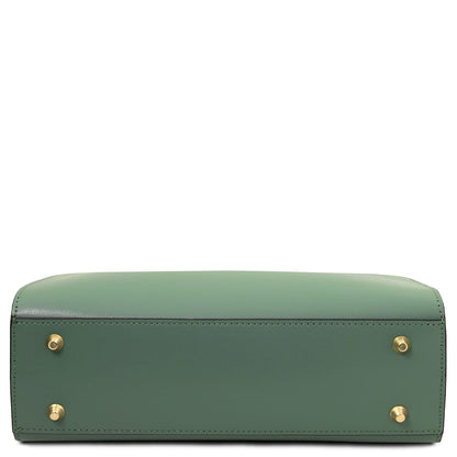 Bottom view of Musa Italian leather handbag in sage green with four gold-tone feet