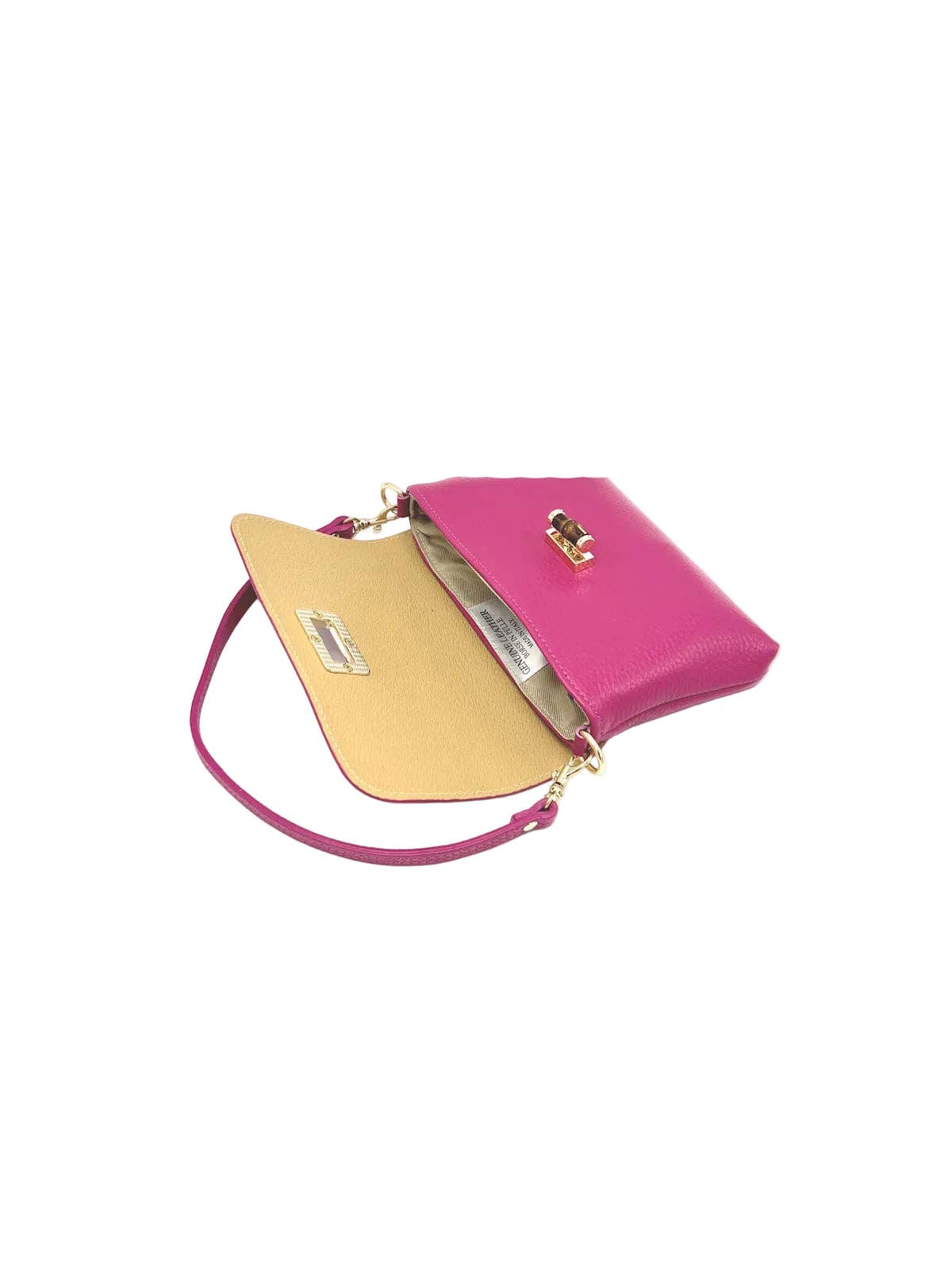 Fuchsia pink clutch handbag with beige interior on a white background