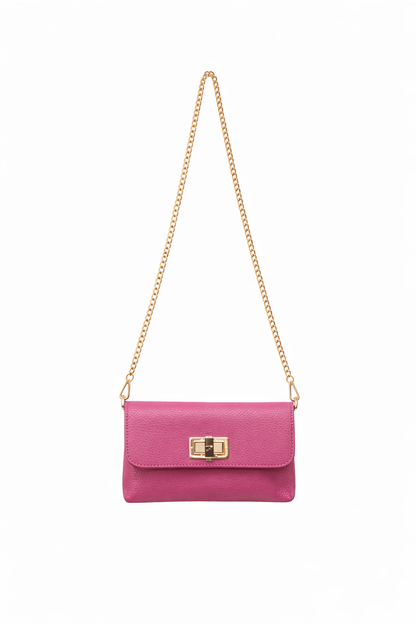 Magenta pebbled leather shoulder bag with a gold chain strap and a gold turn-lock clasp.