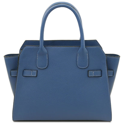 Blue full-grain leather tote bag with double handles and structured design, crafted in Italy with fine stitching details.