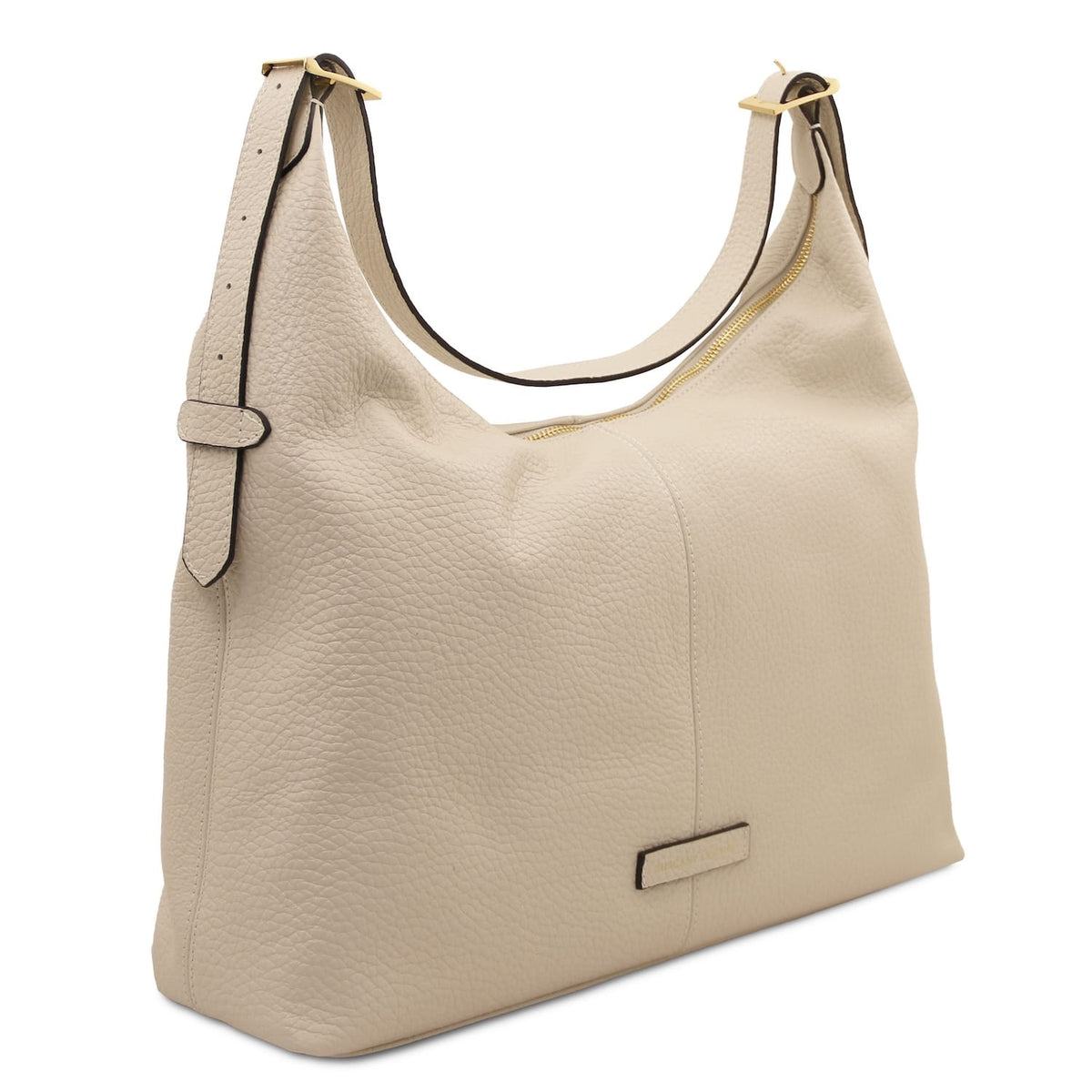 Vista lateral of beige textured Plenia leather bag mostrando the pebbled surface and cremallera dorada along the top
