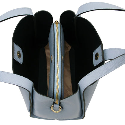 Top view of a azzurro Soave pelle morbida hebag opened to reveal interior compartments e a zip color oro.