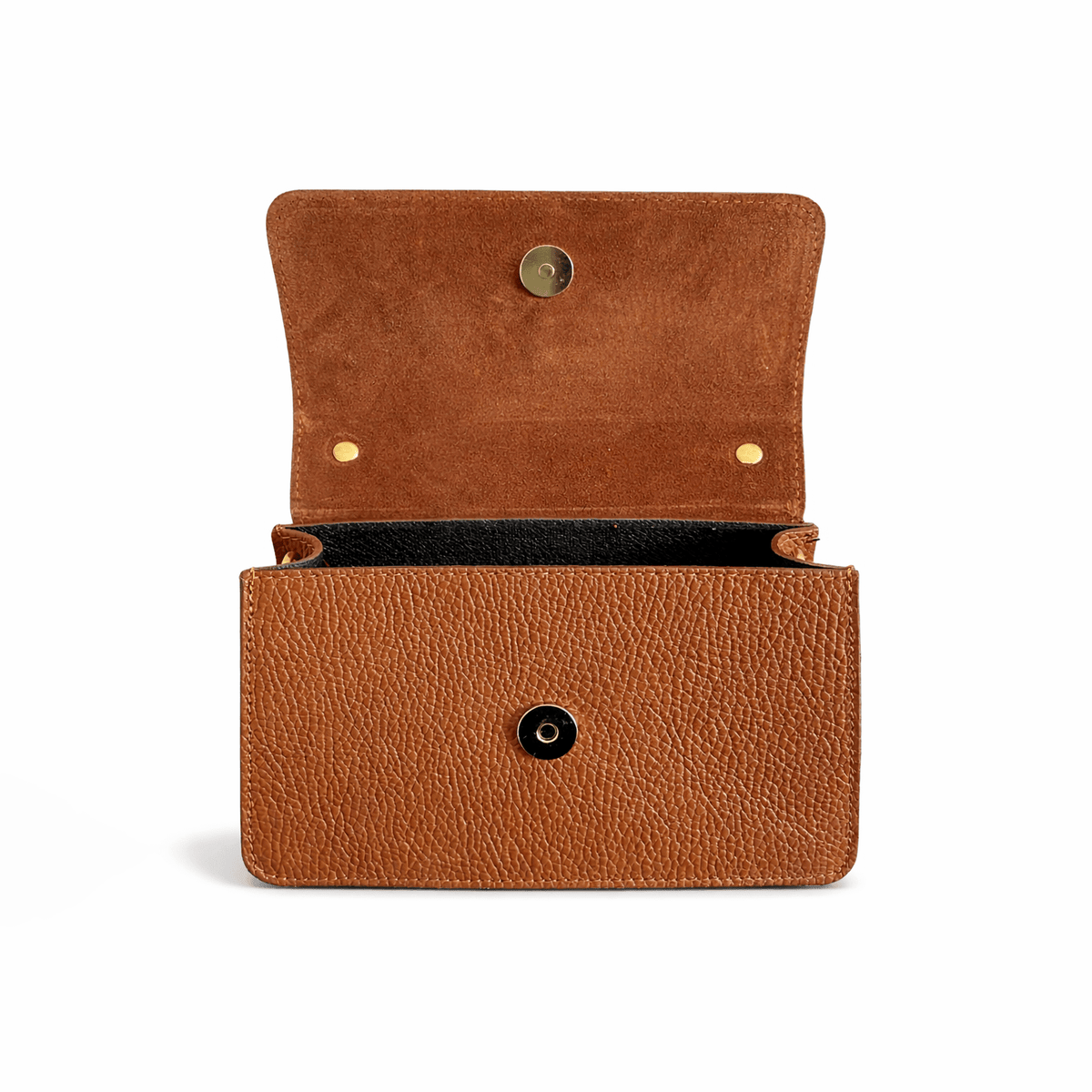 Inside of a brown leather handbag with gold magnetic button sobre fondo blanco