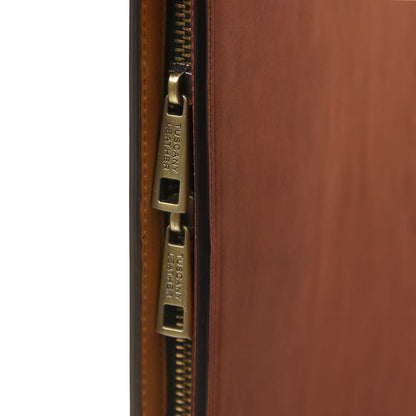 Close up of brass zipper on brown leather Tiberio document case