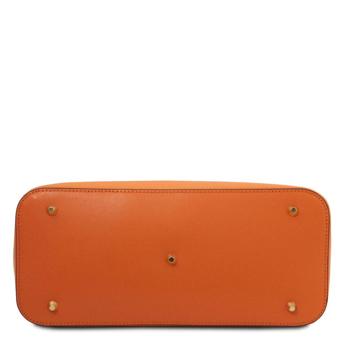 Bottom view of a structured tan leather handbag showcasing gold-tone metal feet and detailed stitching.