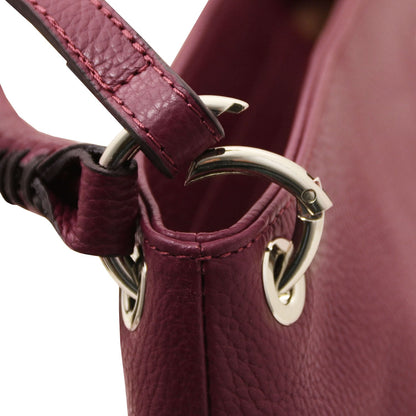 TL Bag - Soft Italian leather handbag | TL142087 in burgundy pebbled leather with silver ring hardware on close-up view