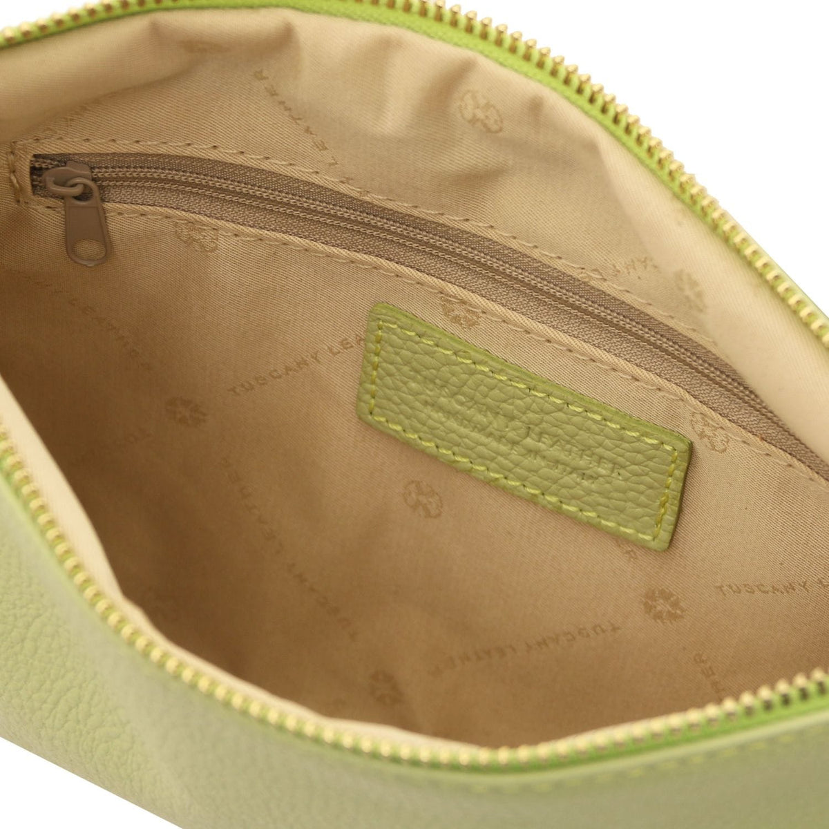 Interior view of light green soft Italian leather pouch clutch showing beige fabric lining and internal zippered pocket.
