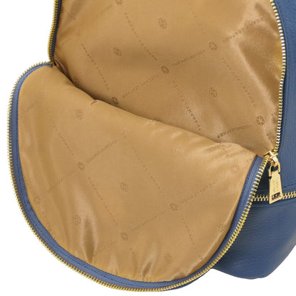 Inside view of TL Bag showing tan patterned lining and edge zipper with gold hardware.