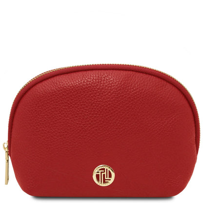 Rosso pelle martellata toiletry case con curved zip color oro e round logo color oro on the front.