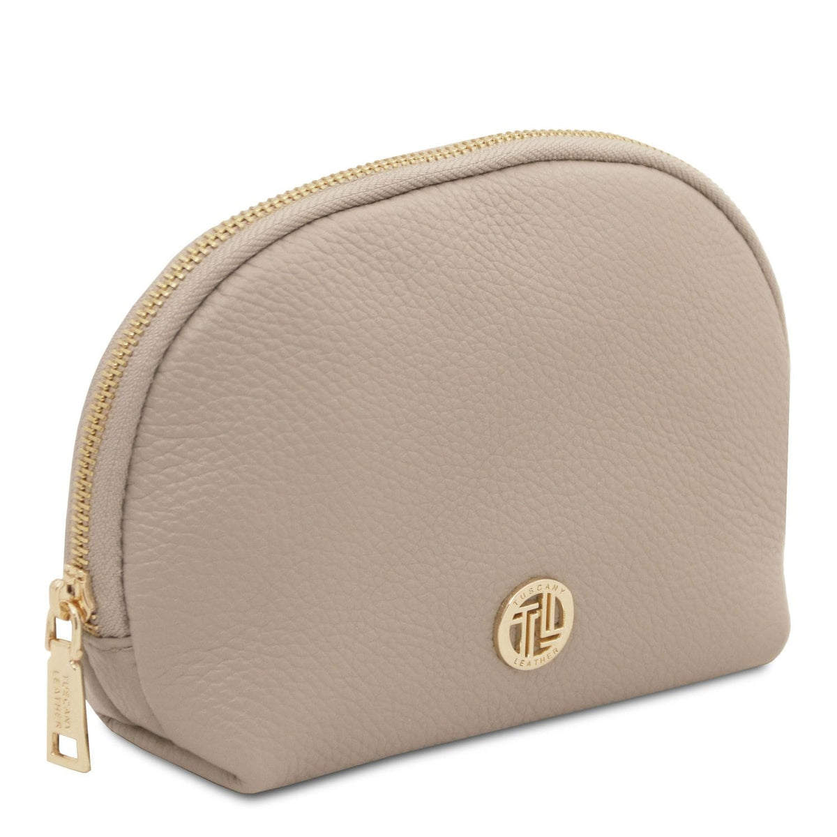 Soft taupe leather toiletry case con pebble grain texture, zip color oro, e round metal logo detail on front.