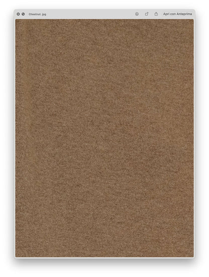 Close-up of soft chestnut marrone fabric texture showing the fine knit detail of the Abito senza maniche a trecce in misto lana e cashmere.